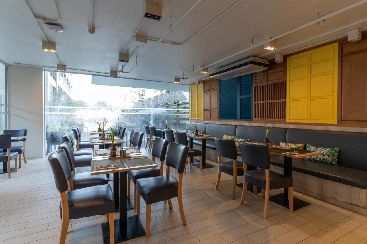 Golden Tulip Pattaya Beachfront Resort Екстер'єр фото Interior of the restaurant
